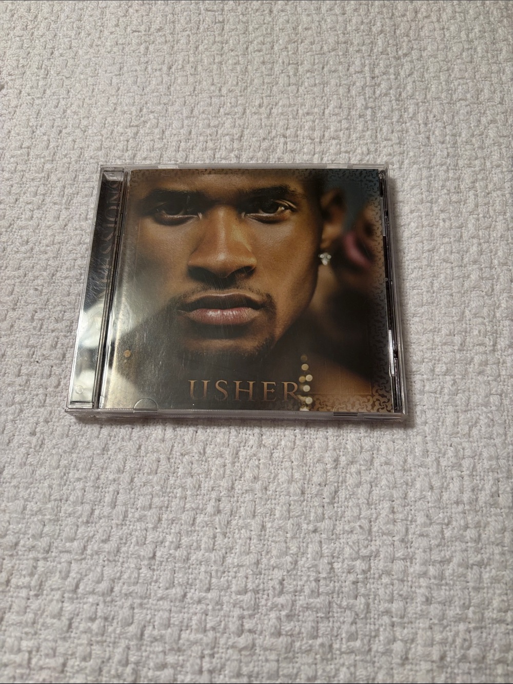 Usher Brown and Gold Portrait CD Cover